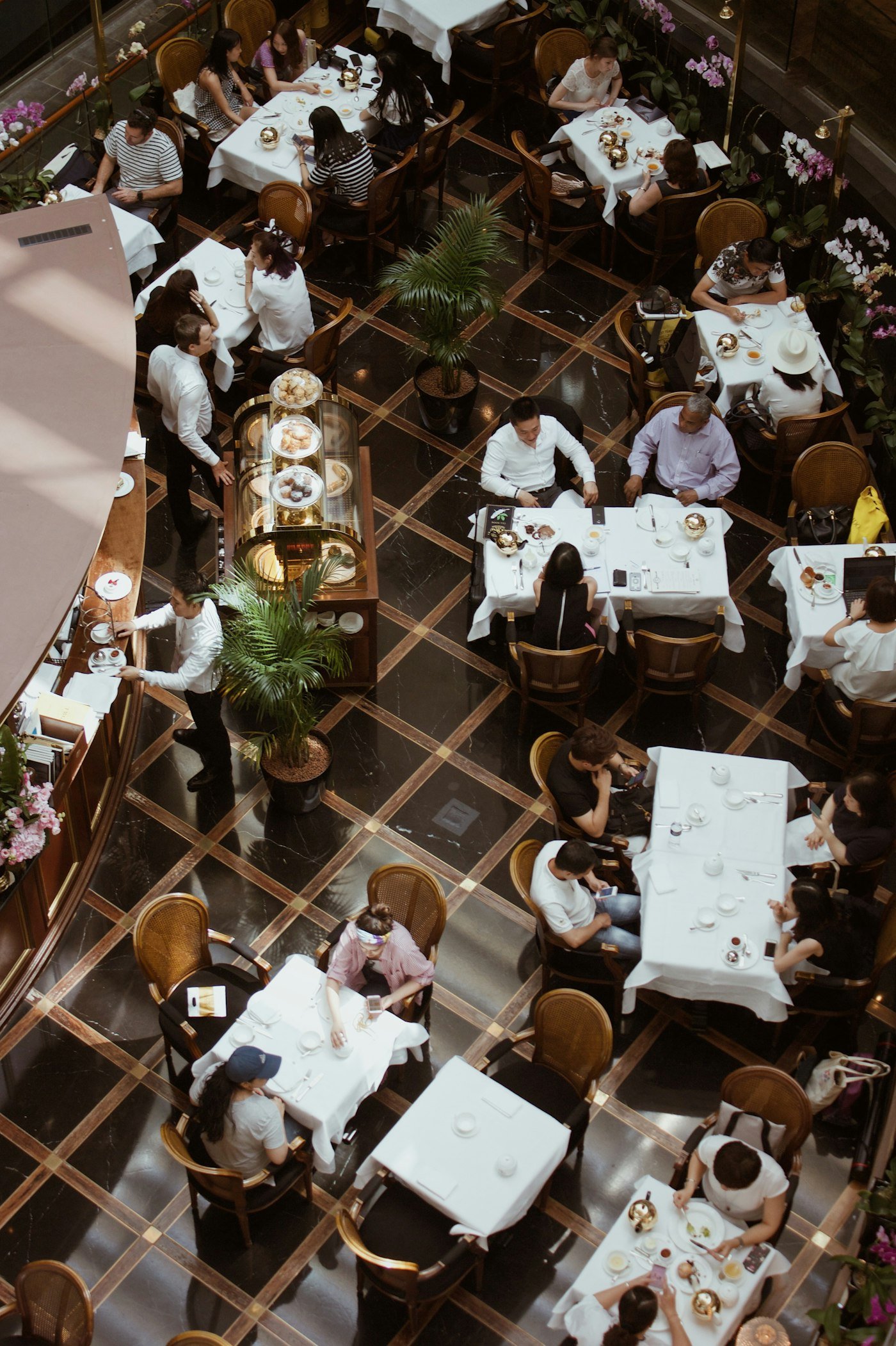 Busy restaurant dining room during evening service